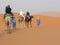 Group of tourist on camels