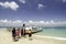 Group of tourist entering white ferry returning to the mainland