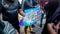 A group of tourist looking at the park guide map of Sunway Lagoon theme park