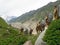 Group of tourists at Bezenghi os Caucasus mountains near Elbrus