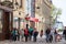 group of tourists, in crowd, visiting ulica Franja Tudjama in the historical center of Vukovar, Croatia, during a guided tour