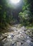 Group of tourists explore entrance to beautiful Hang Tien Cave in Phong Nha Ke National Park. Vietnam