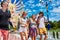 Group of tourists exploring buddhist temple in thailand