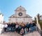 A group of tourists in front of st James cathedral