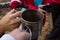 Group tourists girls on the nature drinking warming drink. Celebration goal. Clink glasses