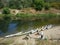 A group of tourists going kayaking on the river.