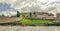 Group of tourists outside the Basilica of San Francesco d`Assisi in Italy, view of Assisi, the Umbria region, Italy