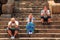 Group of tourists on the staircase of the temple.