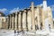 A group of tourists walking around Hadrians Library of the roman emperor