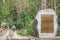 A group of tourists walking on a trail at Headquarters of Dien Bien Phu Campaign in primeval forest. Dien Bien District, Vietnam