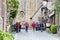 A group of tourists walks in Conques France