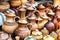 Group of traditional handmade pottery for sale at the market. Ukrainian handmade earthenware utensil. Souvenirs From Ukraine