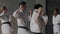 Group training fighting stance in martial arts. Warlike, brave Male and female teens practice fight technique. They show