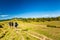 Group of trekkers hikers with backpacks descending with veiw of Maramures ridge from Rodna Mountains, Muntii Rodnei National Park