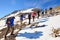 A group of trekking tourists to climb in the mountains