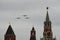 A group of turboprop strategic bombers Tu-95MS fly over Red Square in an air parade dedicated to the 75th anniversary of Victory D