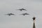 A group of turboprop strategic bombers Tu-95MS fly over Red Square in an air parade dedicated to the 75th anniversary of Victory D