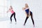 Group of two fit young women having a fitness dance class