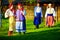 Group of ukrainian people walking the village after folk festivities