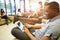 Group Of University Students Relaxing In Common Room