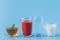 Group Useful Colorful Beverages Drink Milk Tea Juice Water on  Blue Background