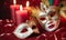 A group of Venetian or Mardi Gras masks on a dark, glittery surface with a bokeh light effect in the background.