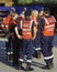 Group of volunteer security guards at a religious event in Terlizzi, Apulia. On the back of the