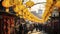 Group Walking Down Street Under Yellow Lanterns