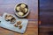 Group of walnut in wooden bowl on wood background, copy space, super food concept