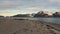 Group of walruses relax on sunset background of Arctic Ocean in Svalbard.