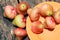 A group water guava that is picked on its own tree and photographed on a wooden table at home, not fancy