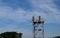 Group of Water tower rising from trees against blue sky,Constructed at a height sufficient to pressurize a water supply system