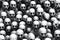 A group of white human skulls in black and white,  Halloween concept