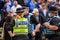 A group of white Police Officers wear PPE Face Masks at a Black Lives Matter Protest rally