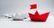 Group of white and red paper boats - 3D illustration