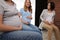 Group of women at courses for expectant mothers indoors, closeup