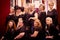 Group of women posing in hairdressing salon