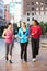 Group Of Women Power Walking On Urban Street