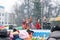 The group of women sing a song on Maslenitsa, people enjoy the concert in Moscow.