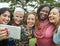 Group Of Women Taking Pictures Concept