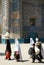 A group of women walk past the Shrine of Khwaja Abu Nasr Parsa or Green Mosque in Balkh, Afghanistan