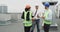 Group of workers in a construction site engineer architect businessmen have a meeting on the rooftop of construction