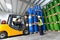 Group of workers with forklift in the logistics industry working