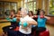 Group working out with dumbbells