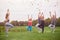 Group yoga exercise outdoor.