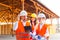 Group of young architects and engineers in helmets