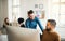 Group of young businesspeople with laptop working in a modern office.