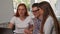 Group of young businesspeople smiling to the camera while working together