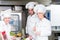 A group of young chefs prepairing meal in luxury restaurant