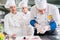 A group of young chefs prepairing meal in luxury restaurant